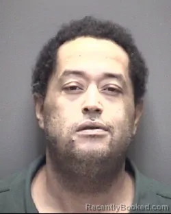 Mugshot of CHRISTOPHER CORINTHIAN SIMMONS booked in Galveston County, Texas on May 14, 2026