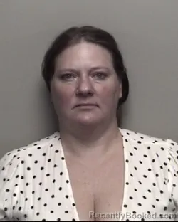 Mugshot of CLARE MARIE GRUBER booked in Galveston County, Texas on June 21, 2026