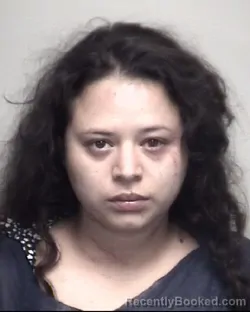 Mugshot of MARTHA ARGENTINA REYES ESTRADA booked in Galveston County, Texas on July 7, 2026