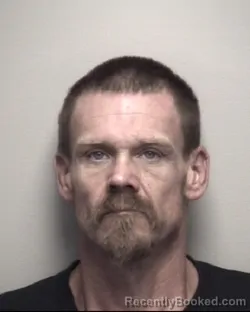 Mugshot of DENNIS SHAWN ROMINE booked in Galveston County, Texas on July 10, 2026