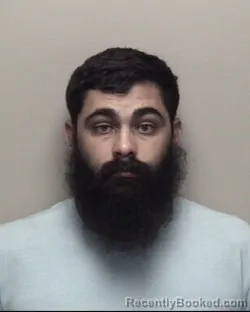 Mugshot of DAVID PAUL KIRAN THAKAR booked in Galveston County, Texas on July 11, 2026