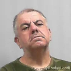 Mugshot of Christopher Shannon Wells booked in Logan County, West Virginia on May 2, 2026