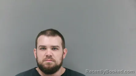Mugshot of Justin Allen Brown booked in Logan County, West Virginia on September 28, 2026