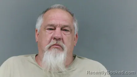 Mugshot of John Henry Mullins booked in Logan County, West Virginia on August 19, 2026