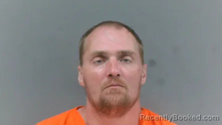 Mugshot of John Sigado booked in Logan County, West Virginia on July 1, 2026