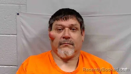 Mugshot of Timmy Tackett booked in Logan County, West Virginia on August 21, 2026