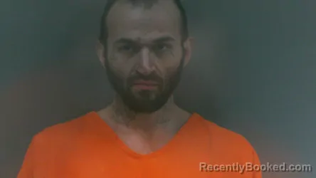 Mugshot of Adam Scott Rowe