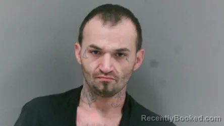 Mugshot of Adam Scott Rowe