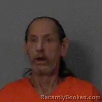 Mugshot of Claude Clifton Starrett