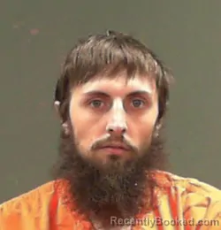 Mugshot of Travis Eugene Helms booked in Marshall County, West Virginia on October 8, 2026