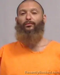 Mugshot of ALEXANDER NAZARIO LASCOLA booked in Monongalia County, West Virginia on June 16, 2026