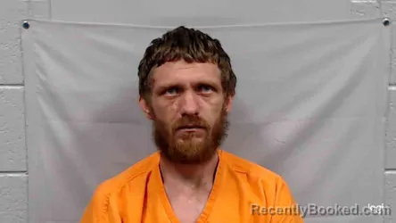 Mugshot of Alexander Elliot Riley