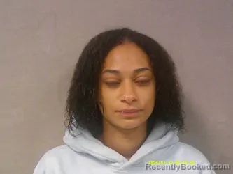 Mugshot of Aiko Lucinda Abido booked in Nicholas County, West Virginia on May 7, 2026
