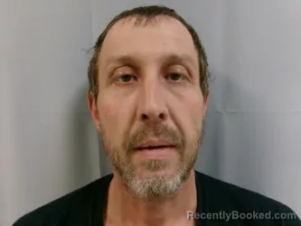 Mugshot of Travis Allen Rider