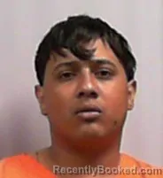 Mugshot of Junior Alexander Mavares-Flores booked in Putnam County, West Virginia on April 27, 2026