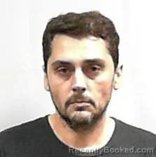 Mugshot of John William Logue booked in Putnam County, West Virginia on October 18, 2026