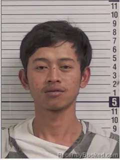 Mugshot of MUHAMAD DIYAS