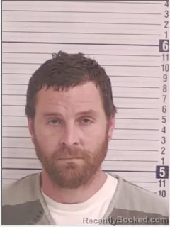 Mugshot of TRAVIS RYAN KNUDSON