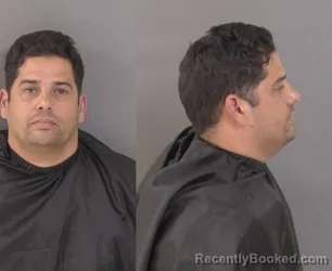 Mugshot of Arquimedes Mario Leon Lopez