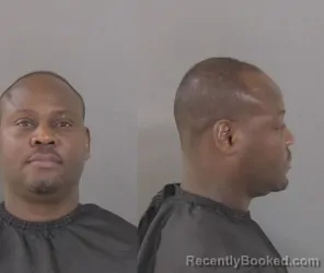 Mugshot of Extraguens Louis