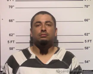 Mugshot of Damon Alec De La Cruz booked in Gillespie County, Texas on April 20, 2026