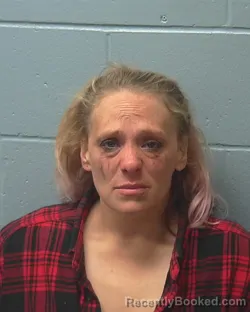 Mugshot of ASHLEY MARIE TUTTLE booked in Adams County, Wisconsin on April 25, 2026
