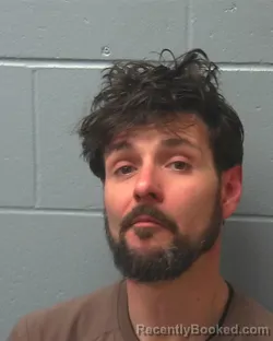 Mugshot of MICHAEL TOM HANETHO booked in Adams County, Wisconsin on April 10, 2026