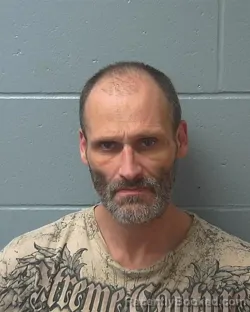 Mugshot of EARL VERNON HOLSTEN