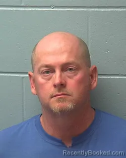 Mugshot of DANIEL EDWARD MUNNS booked in Adams County, Wisconsin on June 4, 2026
