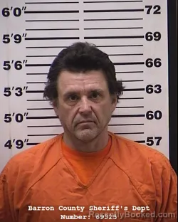 Mugshot of Russell Robert Schroeder booked in Barron County, Wisconsin on April 8, 2026