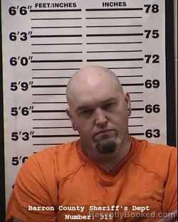 Mugshot of Sebastian James Rahm reichenberger booked in Barron County, Wisconsin on June 16, 2026