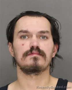 Mugshot of JUSTIN NMI AWONOHOPAY