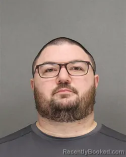 Mugshot of AUSTIN MARTIN HILDEBRAND