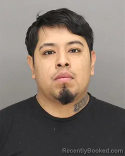 Mugshot of JOSUE NMI GARCIA-HERNANDEZ