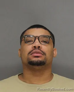 Mugshot of ESSAC LESHAWN EVANS booked in Brown County, Wisconsin on April 10, 2026