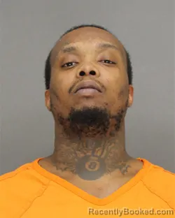 Mugshot of CHRISTOPHER NMI PENNIL booked in Brown County, Wisconsin on April 13, 2026