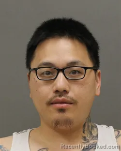 Mugshot of JOHN NMI LEE booked in Brown County, Wisconsin on April 17, 2026