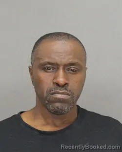 Mugshot of JOHN NMI GROVER booked in Brown County, Wisconsin on April 21, 2026