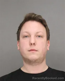 Mugshot of CHRISTOPHER DYLAN MERKL booked in Brown County, Wisconsin on April 21, 2026