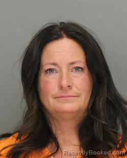 Mugshot of JINI DAWN RINARD booked in Brown County, Wisconsin on April 26, 2026