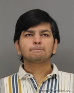 Mugshot of CHANDAN MADHUKAR BHANGALE booked in Brown County, Wisconsin on May 8, 2026