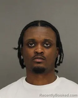 Mugshot of GARVEY UHURU DURRAH booked in Brown County, Wisconsin on June 18, 2026