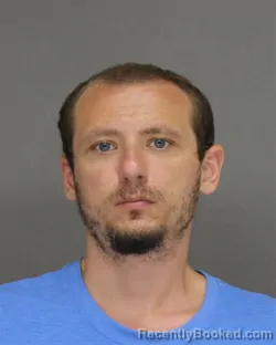 Mugshot of AUSTIN MICHAEL RATHBUN booked in Brown County, Wisconsin on July 7, 2026