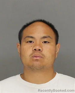 Mugshot of Shawn Nmi Vang booked in Brown County, Wisconsin on August 12, 2026