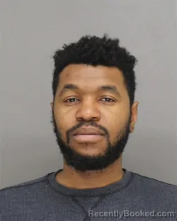 Mugshot of Demetrius Coolione Booker booked in Brown County, Wisconsin on August 13, 2026