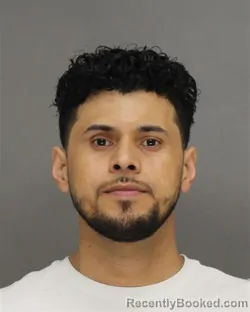 Mugshot of Oscar Naum Galeano-Cruz booked in Brown County, Wisconsin on August 14, 2026