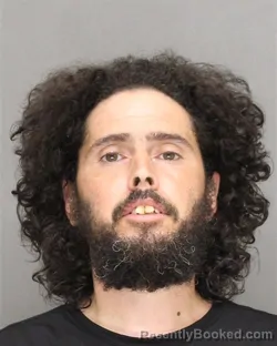 Mugshot of Alexander Luis Marquez booked in Brown County, Wisconsin on August 15, 2026