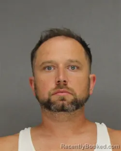 Mugshot of Andrey Vladimir Pidkalyuk booked in Brown County, Wisconsin on August 20, 2026