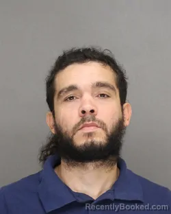 Mugshot of Israel Junior Ortiz-Santiago booked in Brown County, Wisconsin on August 28, 2026
