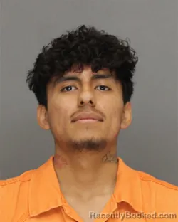 Mugshot of Manuel Nmi Garcia booked in Brown County, Wisconsin on August 30, 2026